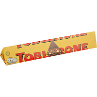 Шоколад Toblerone швейцарский молочный с медово-миндальной нугой 100 г фото Шоколад Toblerone швейцарский молочный с медово-миндальной нугой 100 г