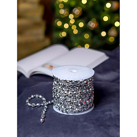 Бусы новогодние на елку Miland Торжество 1000 см пластиковые серебристые фото Бусы новогодние на елку Miland Торжество 1000 см пластиковые серебристые