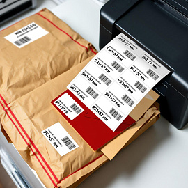 Этикетки самоклеящиеся Комус адресные А4 99.1x57 мм 10 штук на листе белые (100 листов в упаковке)