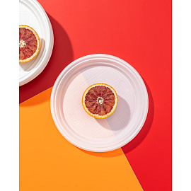 Тарелка одноразовая пластиковая Комус Эконом 205 мм белая (100 штук в упаковке)